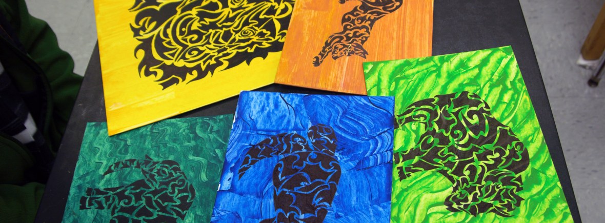 Colorful artwork from GHS student on table